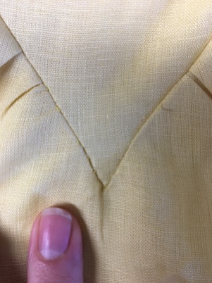 Hand-stitching point into place
