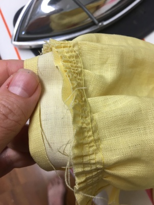 Attaching neckband to body of blouse